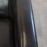 Very comfortable black Art Deco design armchair, made of sheepskin leather