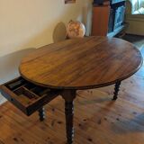 Round table with hinged doors
