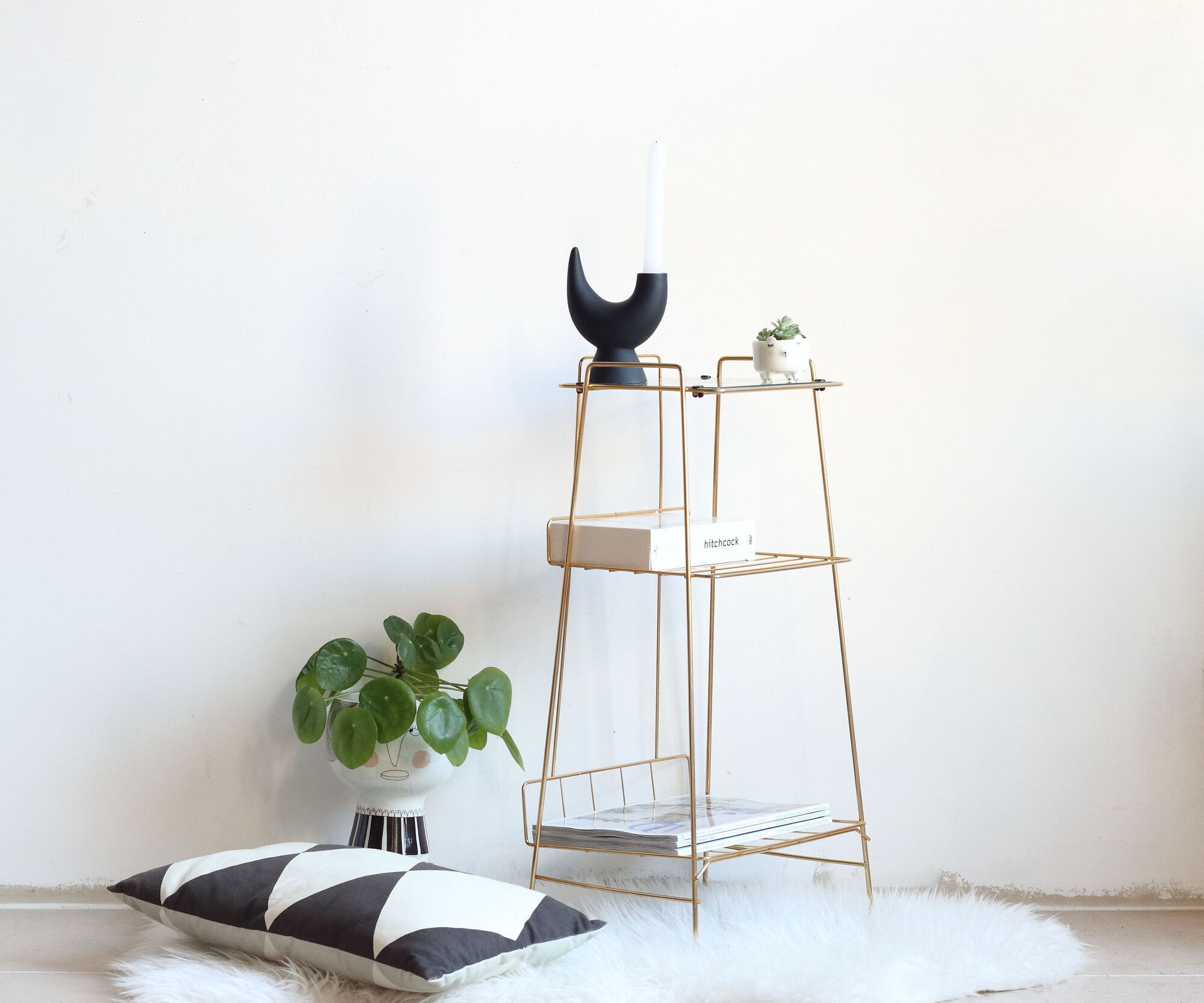 Side table in gilded brass