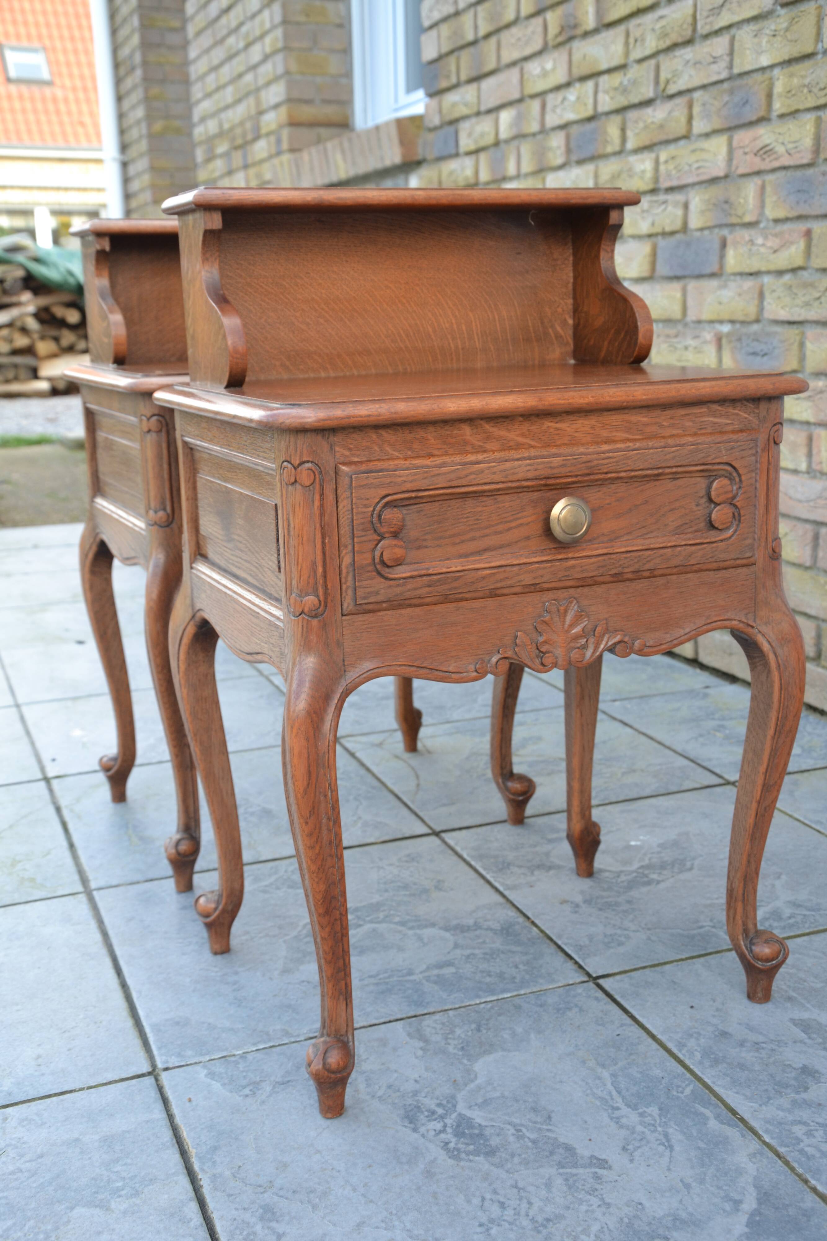 Two oak bedside tables.