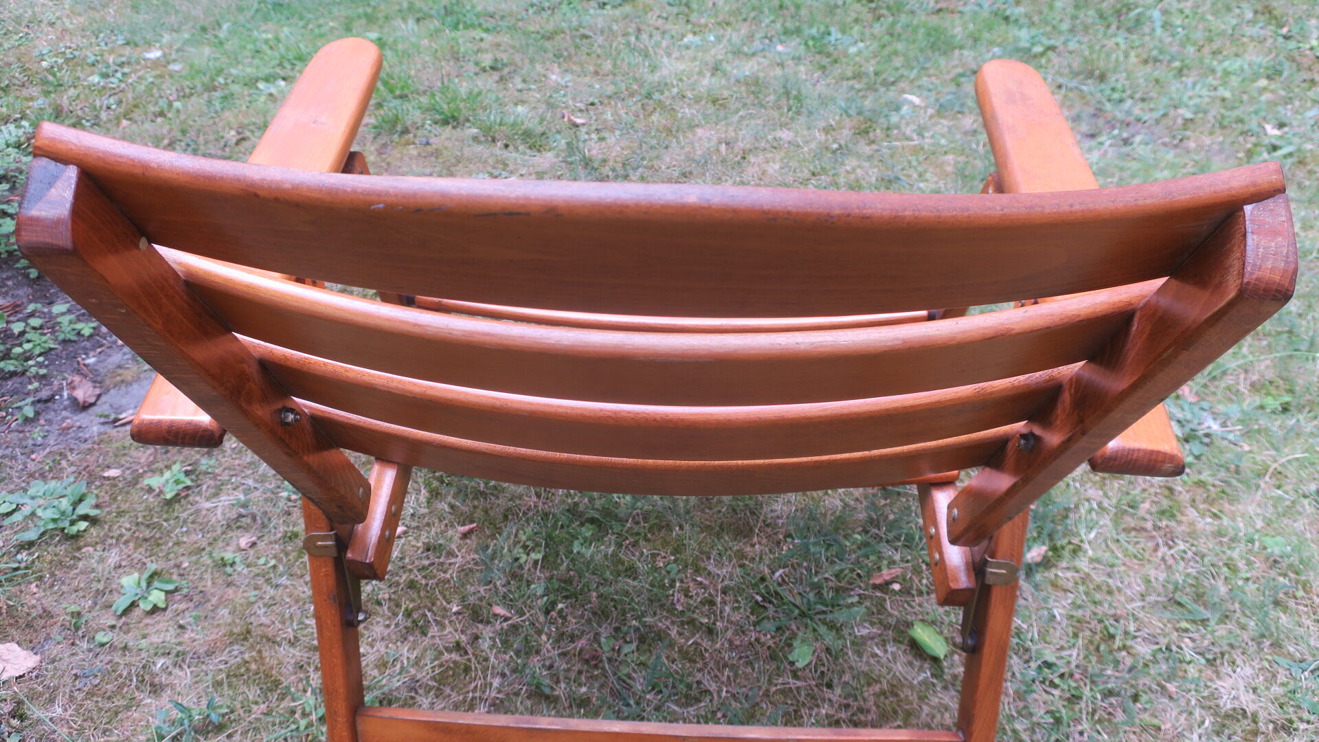 Mid century patinated wood folding garden or patio elbow chair, 1960s