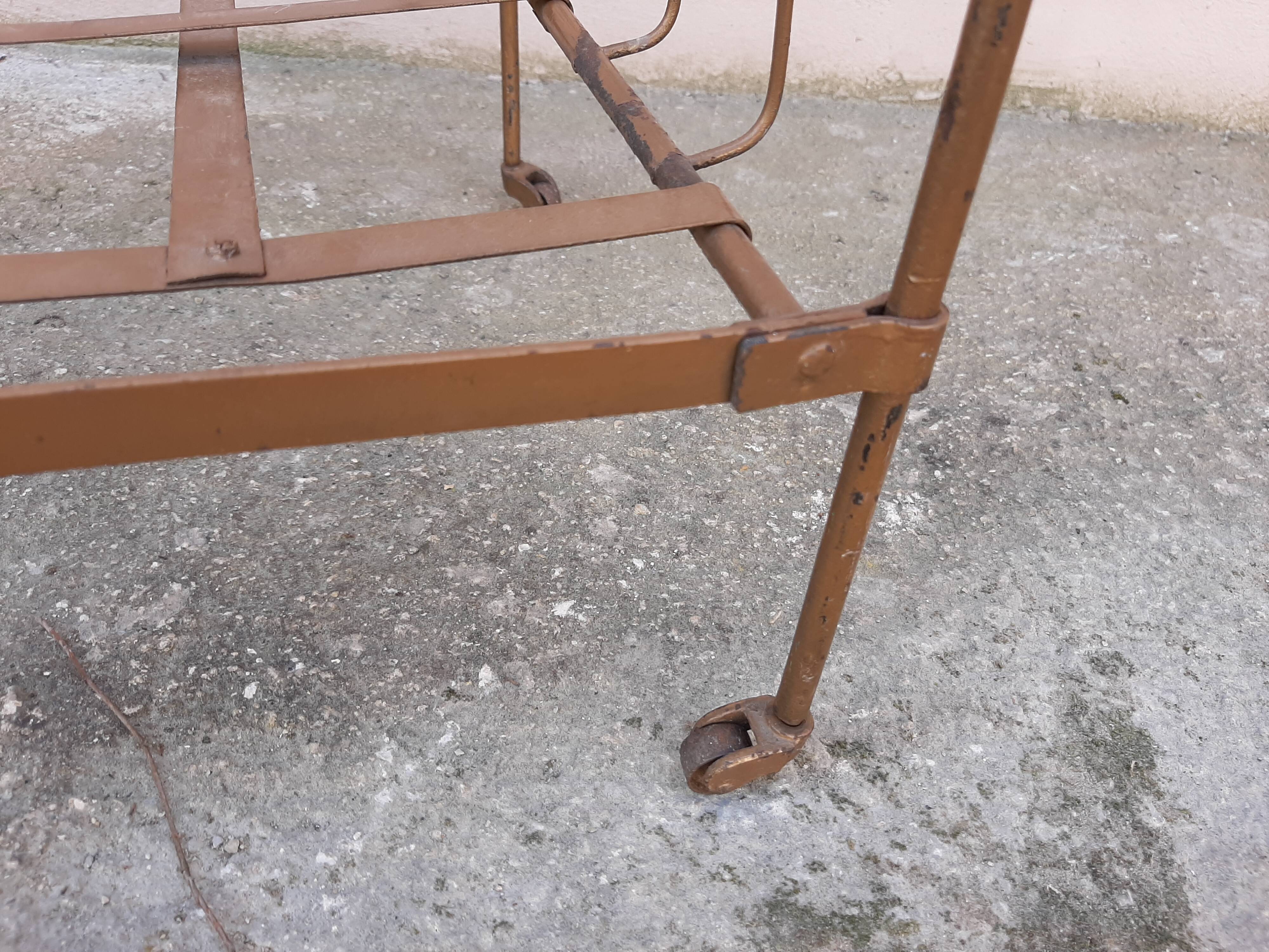 Old child in iron 1900