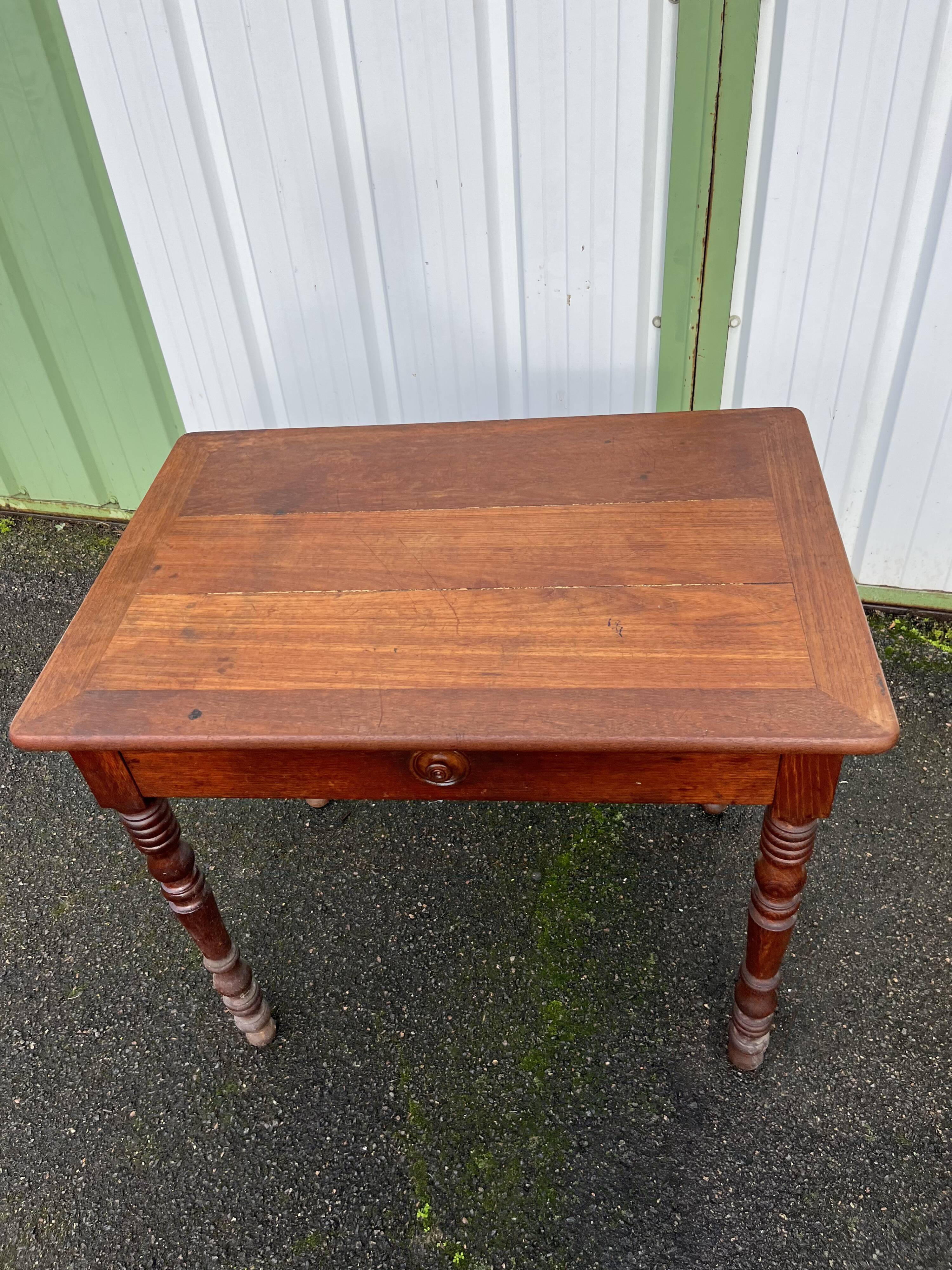 Wooden side table with turned legs