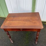 Wooden side table with turned legs