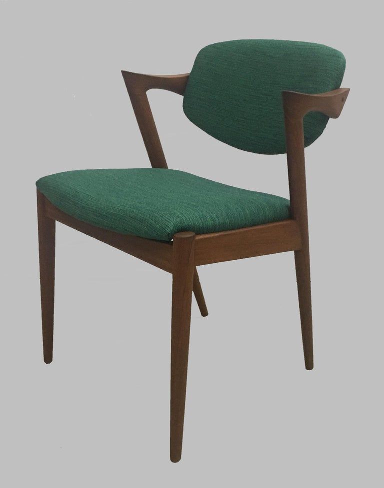 Set of eight restored dining chairs in teak Kai Kristiansen