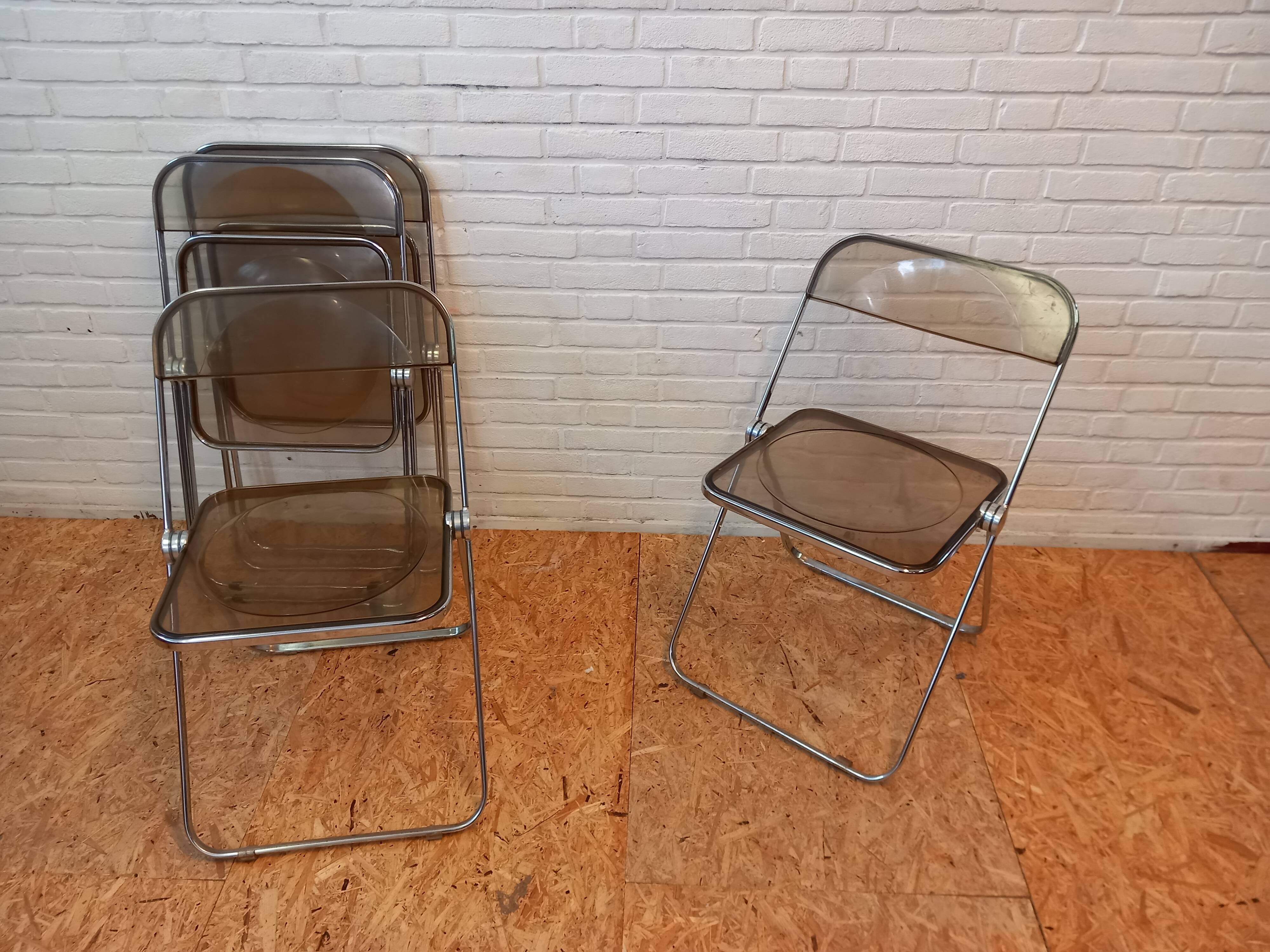Set of 4 Plia chairs, Foldable chairs by Piretti