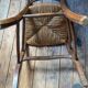 2 wooden chairs with cane