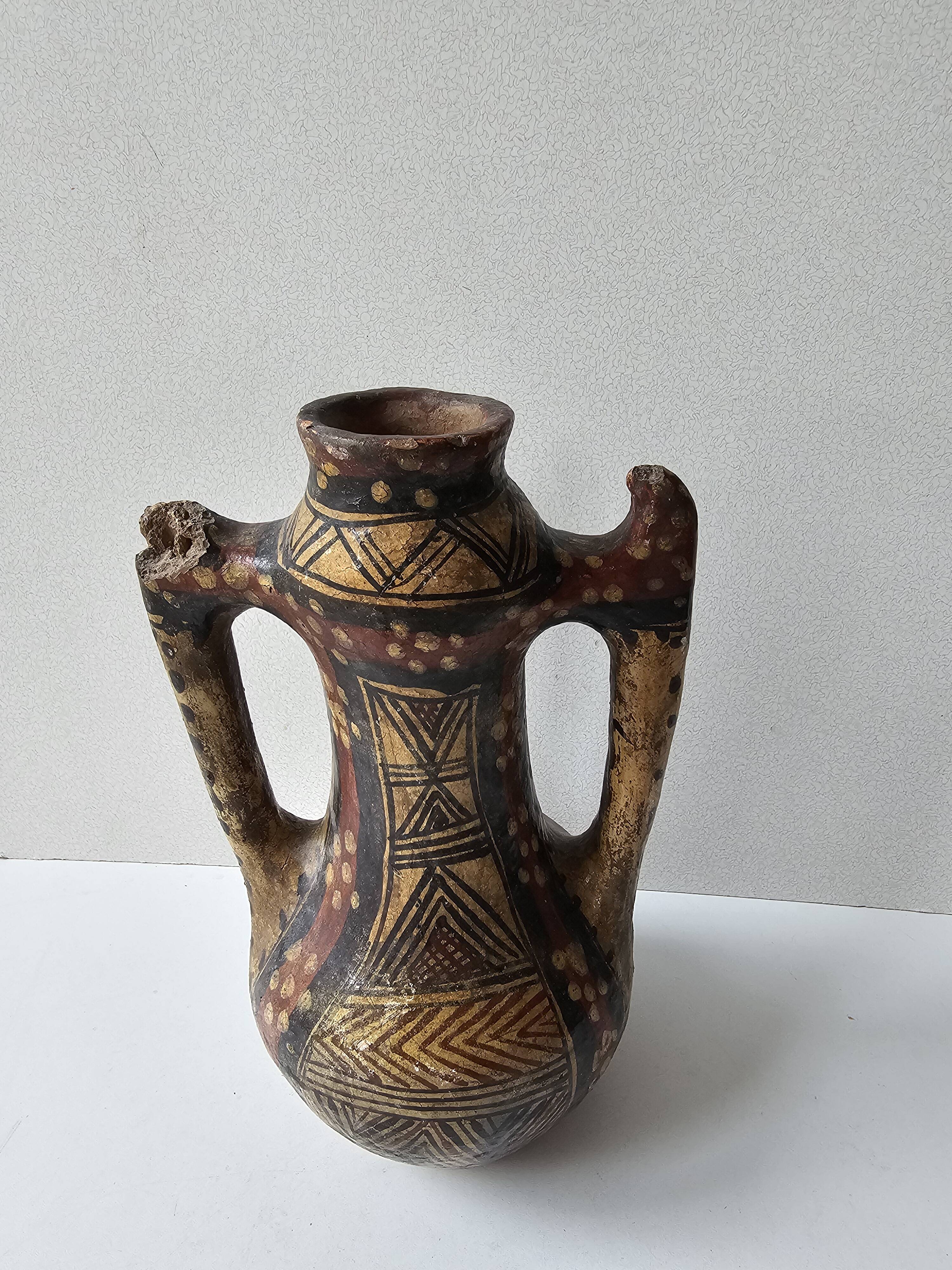 Kabyle Algerian pottery oil jar with polychrome geometric decorations