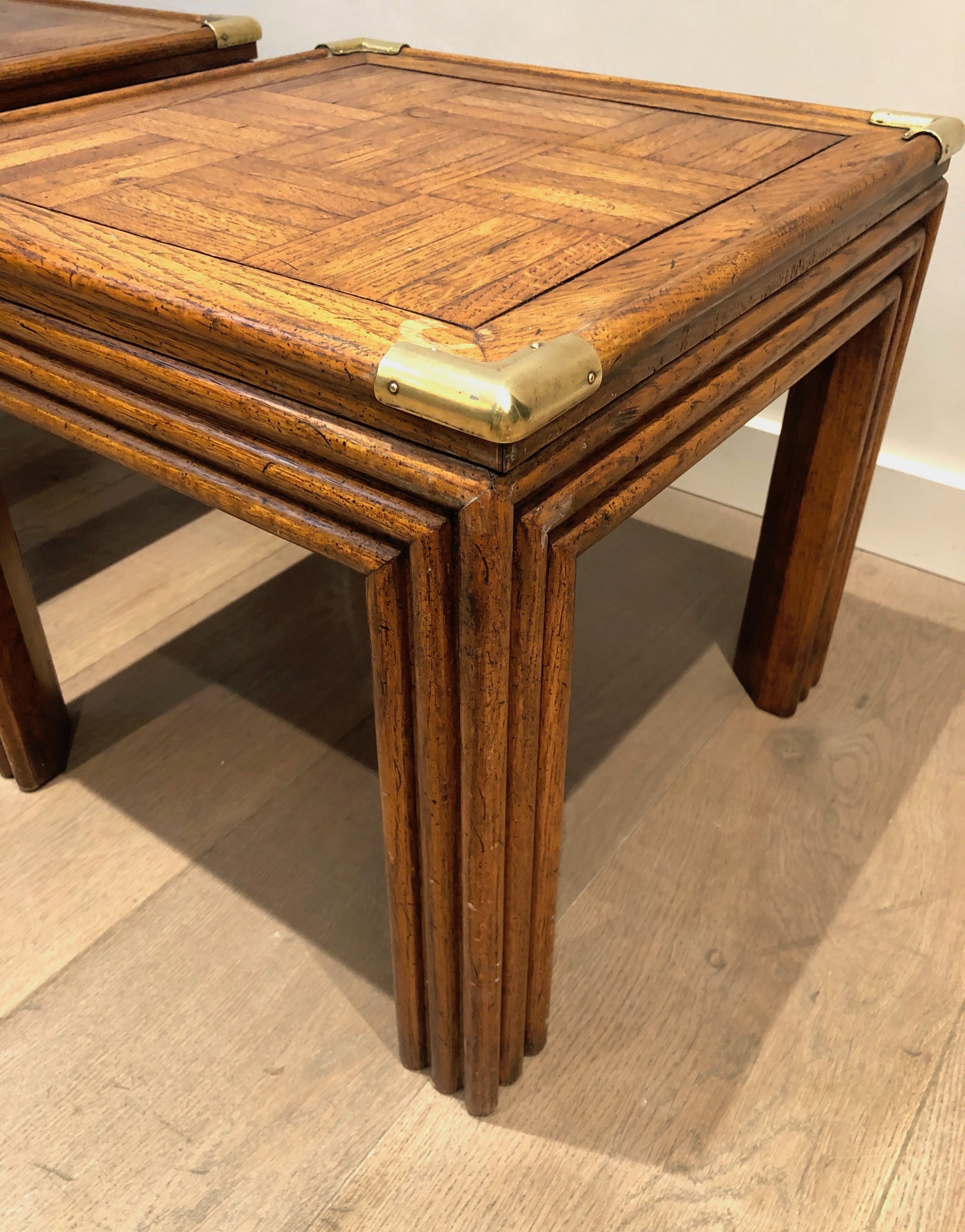 Pair of wooden and brass sofa ends