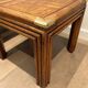Pair of wooden and brass sofa ends
