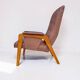 Vintage armchair in light brown faux leather, 1960s.