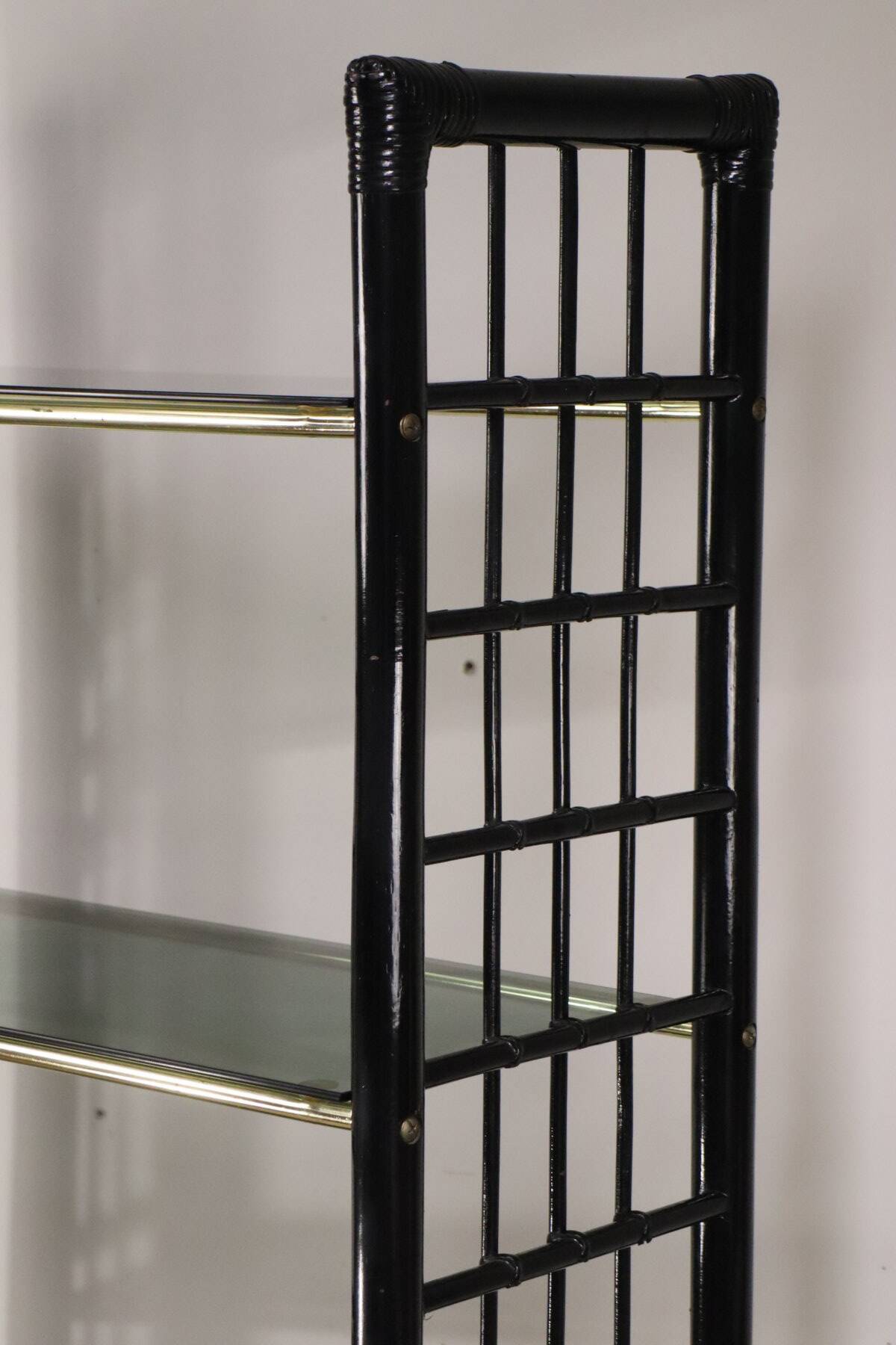 Vintage 1970s shelf in smoked glass with a bamboo-style structure.