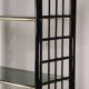 Vintage 1970s shelf in smoked glass with a bamboo-style structure.