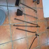 Antique fireplace set in solid wrought iron and brass.