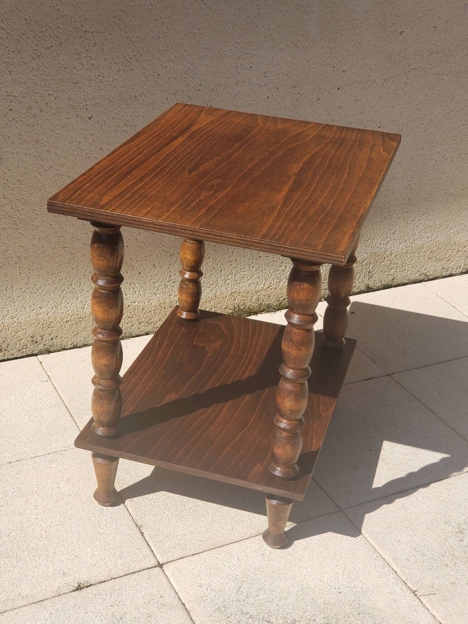 Vintage wooden console side table with turned legs.