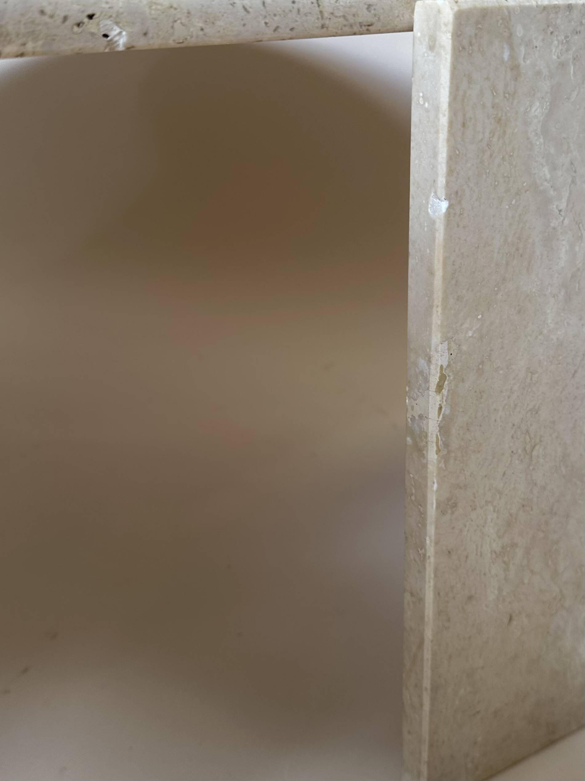 Travertine eye-shaped coffee table