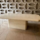Light-colored travertine coffee table