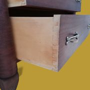 Small veneered wooden Art Deco chest of drawers.