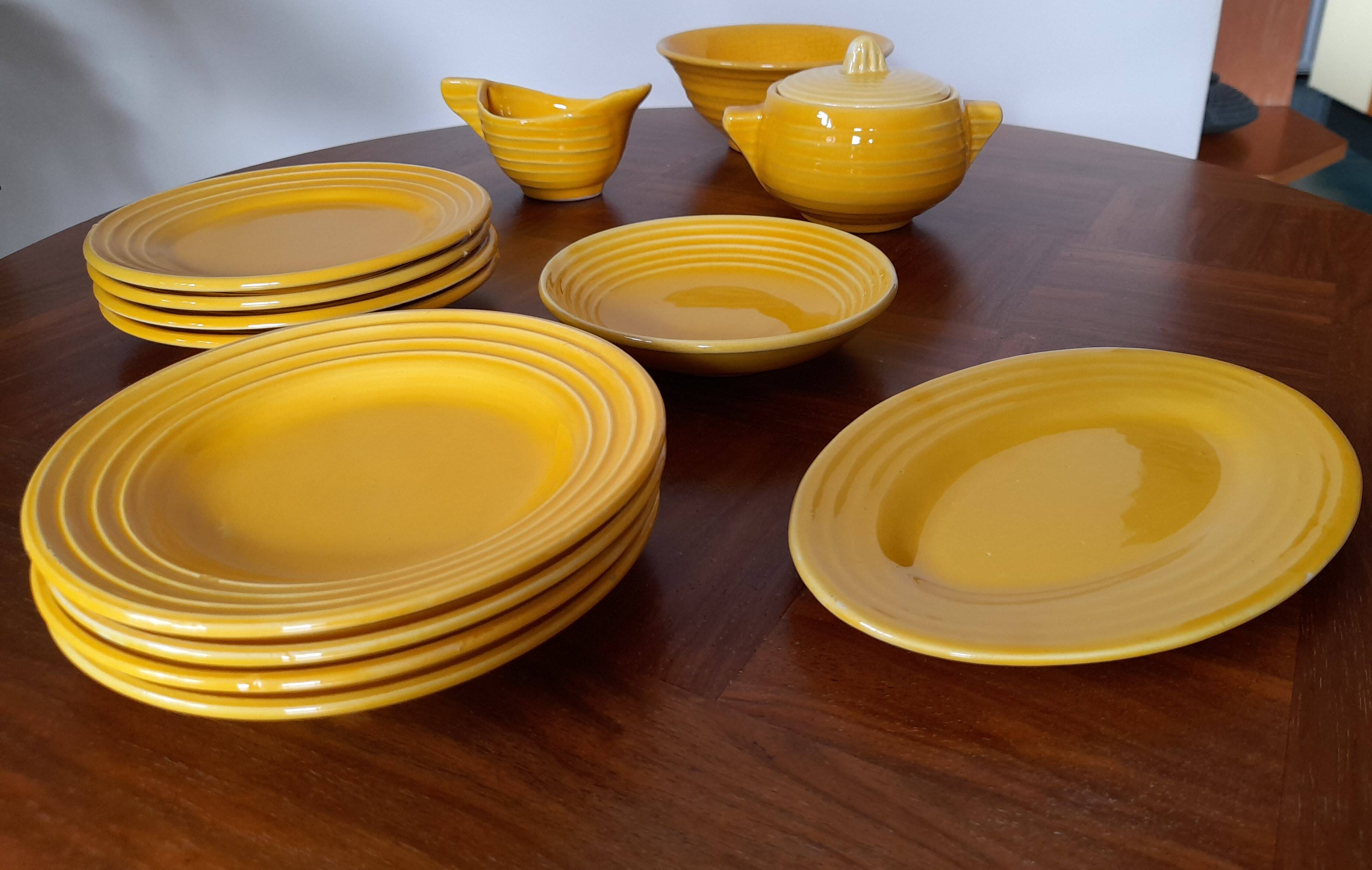 Antique yellow earthenware tea set
