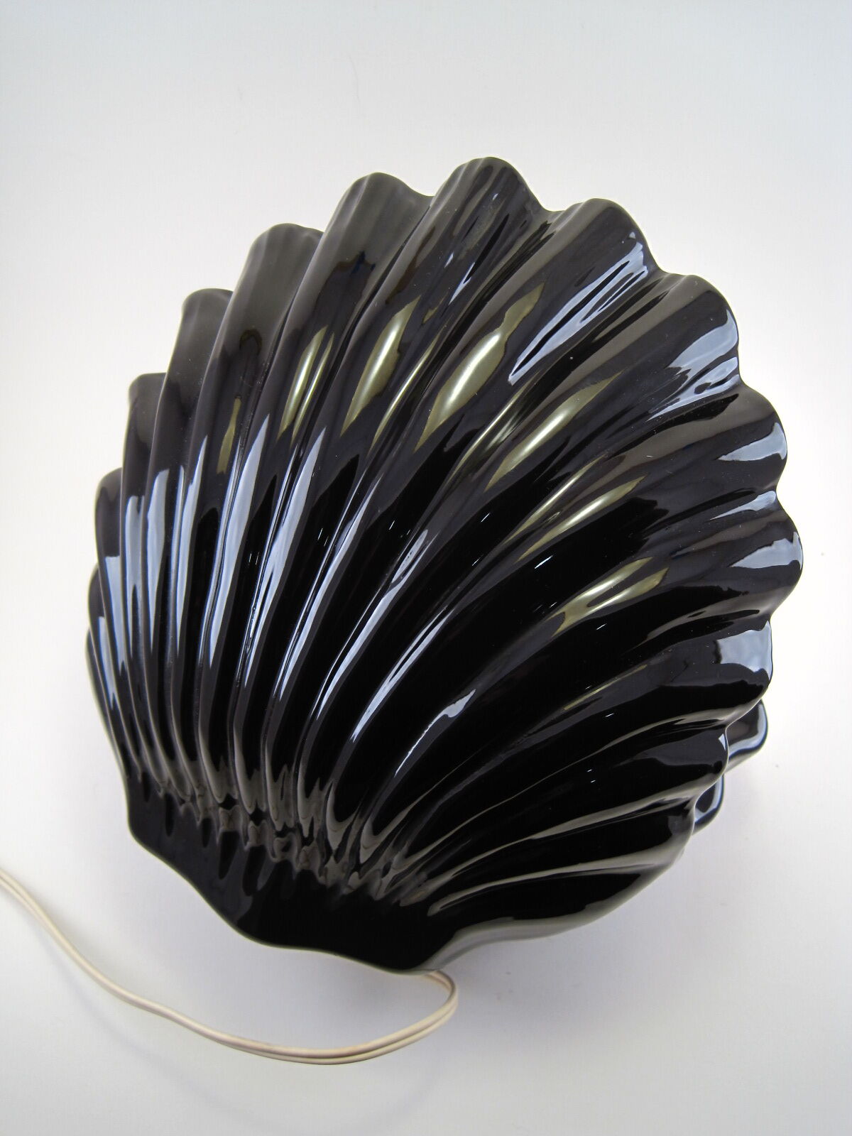 Vintage shell table lamp in black enamel ceramics design seventies 1970