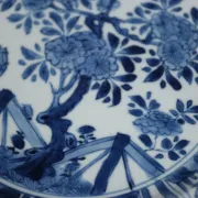 Chinese lobed dish with peony tree and fence – Kangxi, c.1700–1720