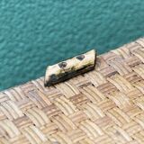 Woven wicker laundry basket