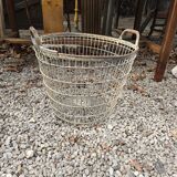 Old iron potato basket