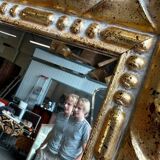 Vintage mirror cut out in a gilded wooden frame