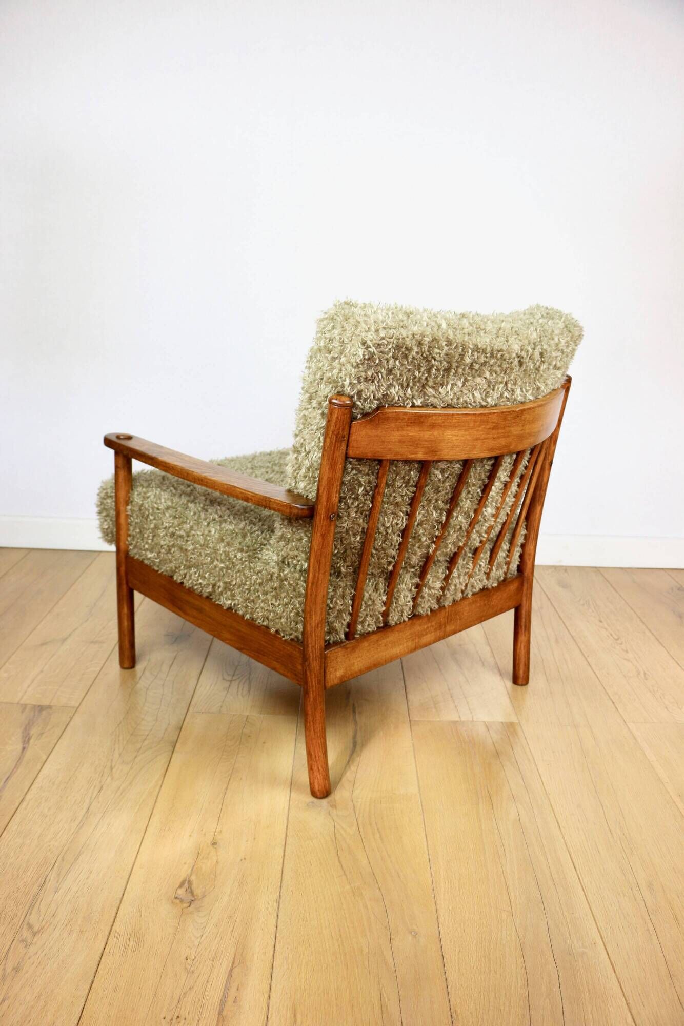 Wooden vintage brown armchair, olive green, long pile on removable cushions