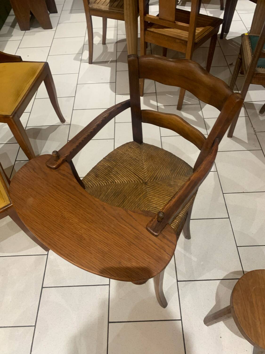 Antique straw-covered high chair