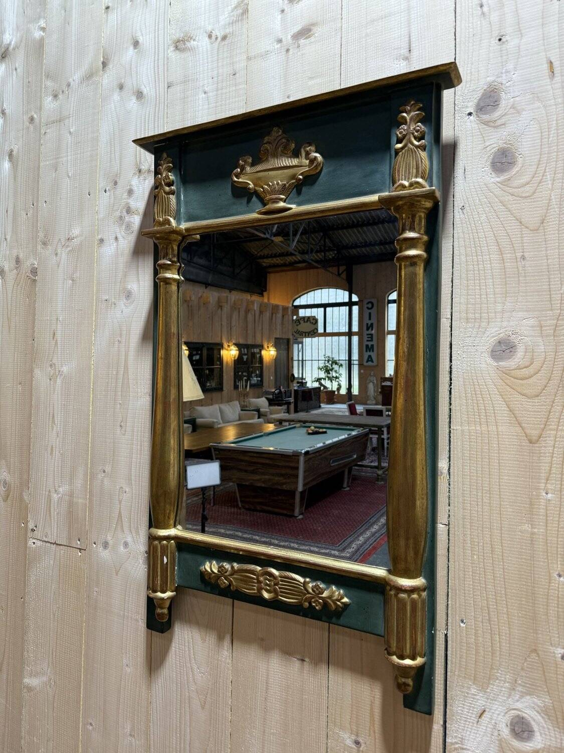 Empire-style mirror in gilded wood