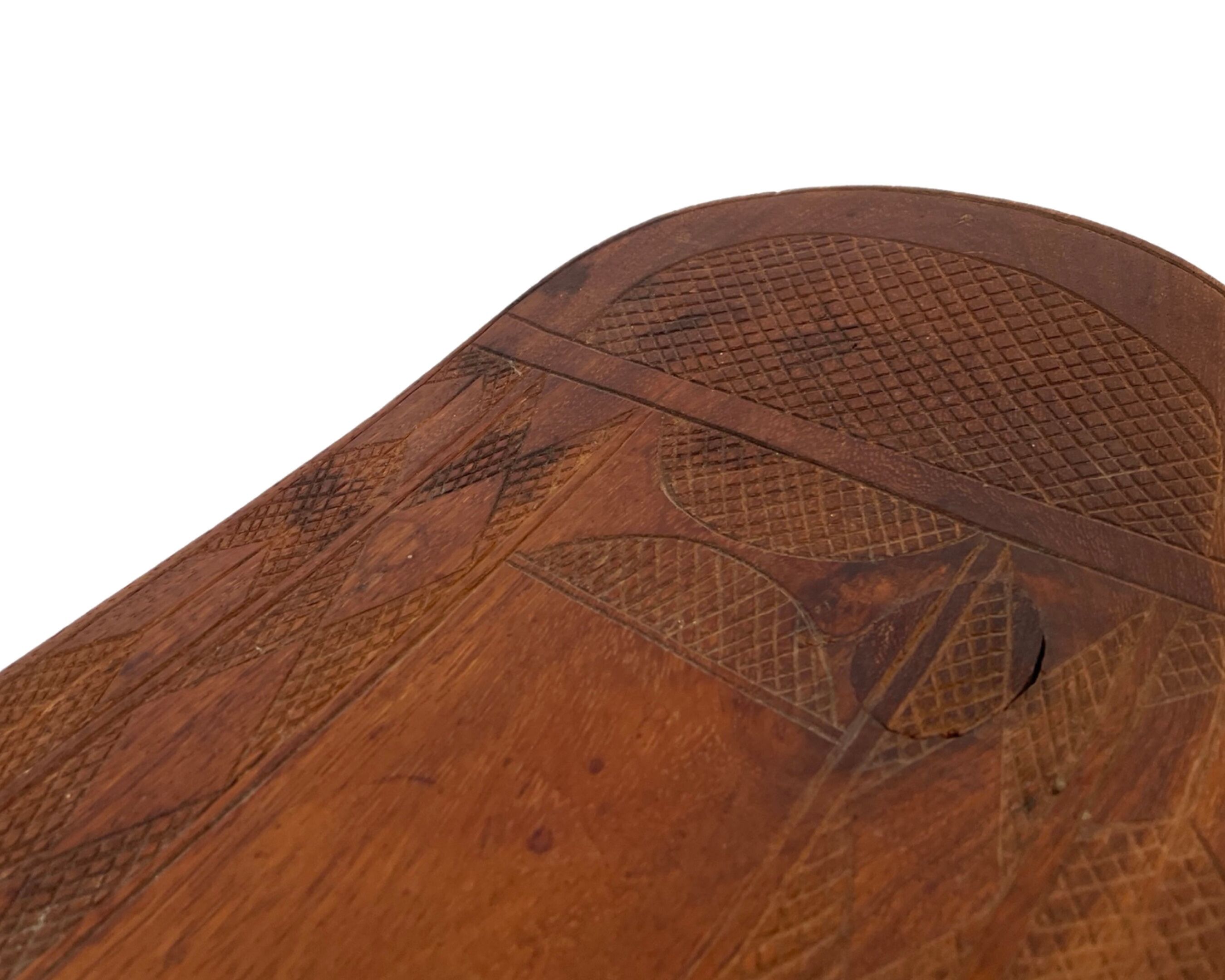 Vintage African hand-carved wooden Senufo stool bench design