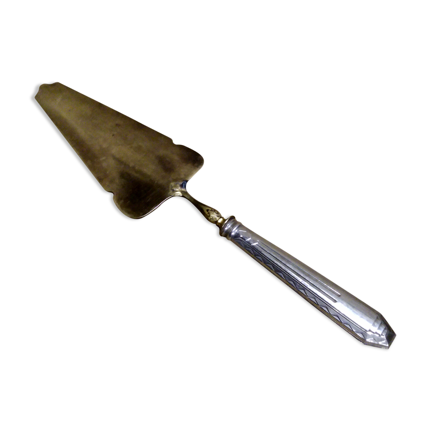 Shovel has silver metal pie art deco
