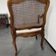 Regency canned armchair in carved walnut