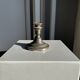 Small antique candle holder engraved in silver-plated metal, in its original condition.