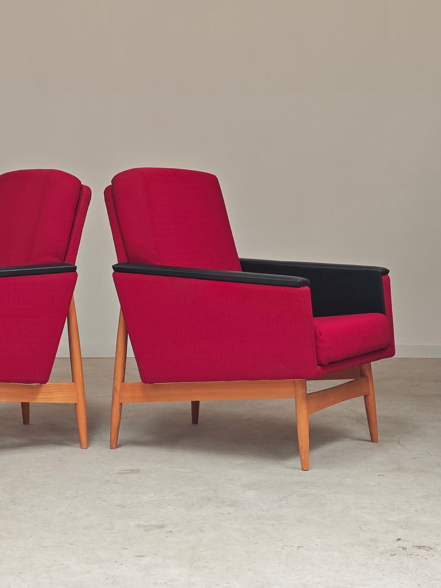 Pair of Drevotex Zamberk armchairs, red fabric and faux leather 1970