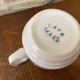 Coffee Cup Mars décor burgundy pink and burgundy triangle edged