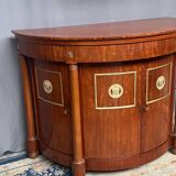 Empire style sideboard. Mahogany. Gilded bronze decoration.