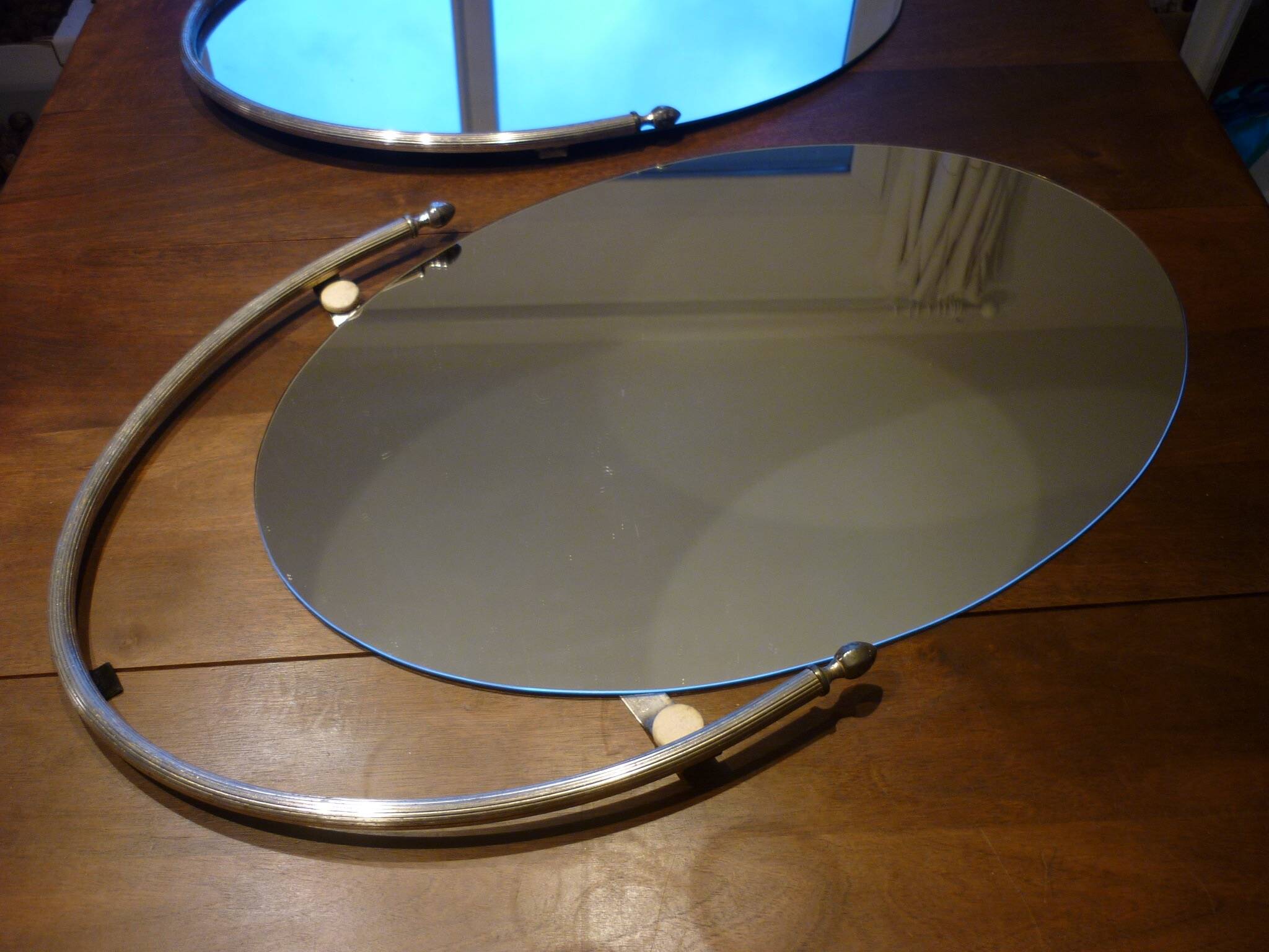 2 bathroom mirrors in silver oval holders