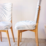 Pair of vintage chairs reupholstered with palm pattern fabric
