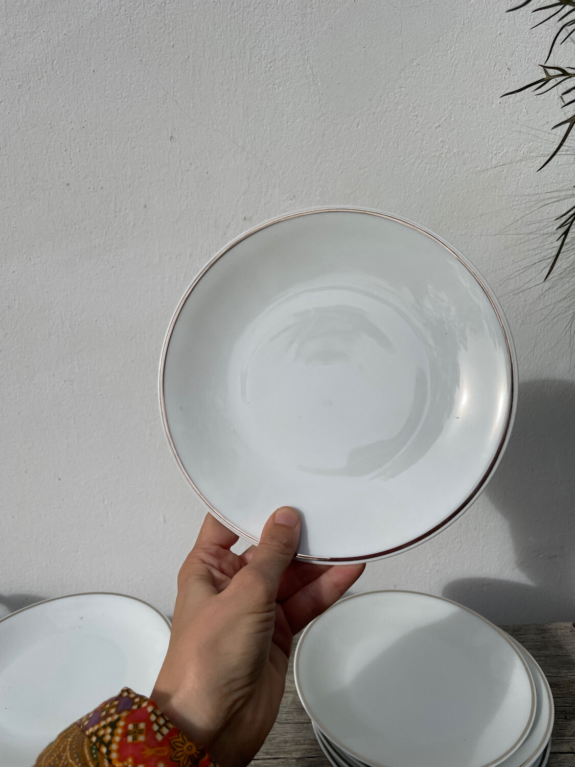 10 assiettes à dessert en porcelaine de Limoges blanches