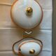 Deux plats en porcelaine rose saumonée et liseré or circa 1900