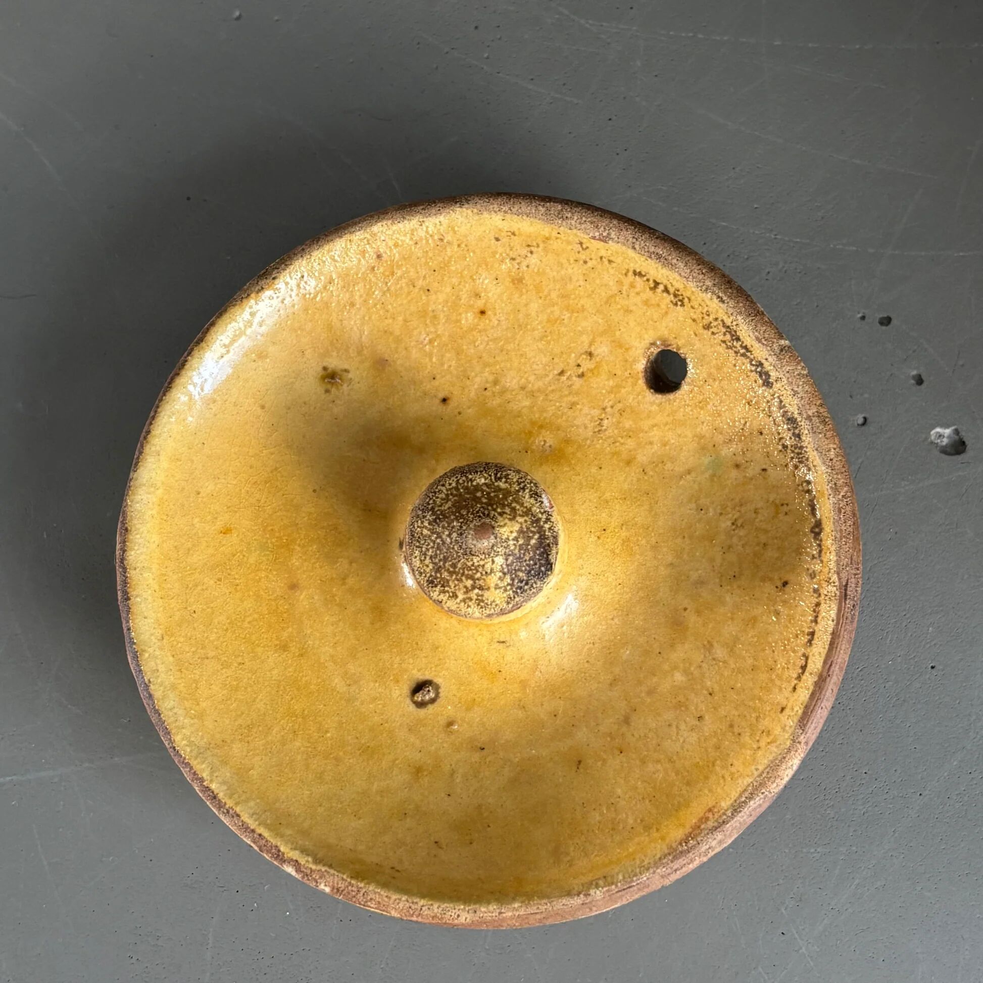 Ancient oil jar in glazed terracotta