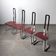 Postmodern chairs in chromed steel and red wood, set of 4, 1980s