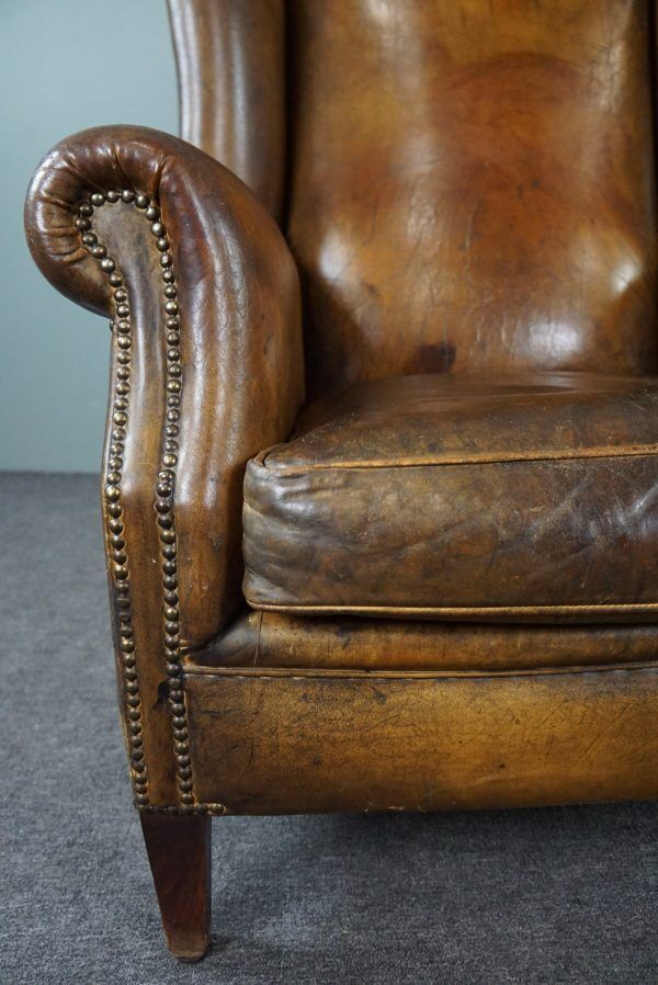 Patinated sheepskin armchair