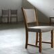 Ensemble de six chaises de salle à manger en chêne vintage danois, style Henning Kjærnulf, années 1960.