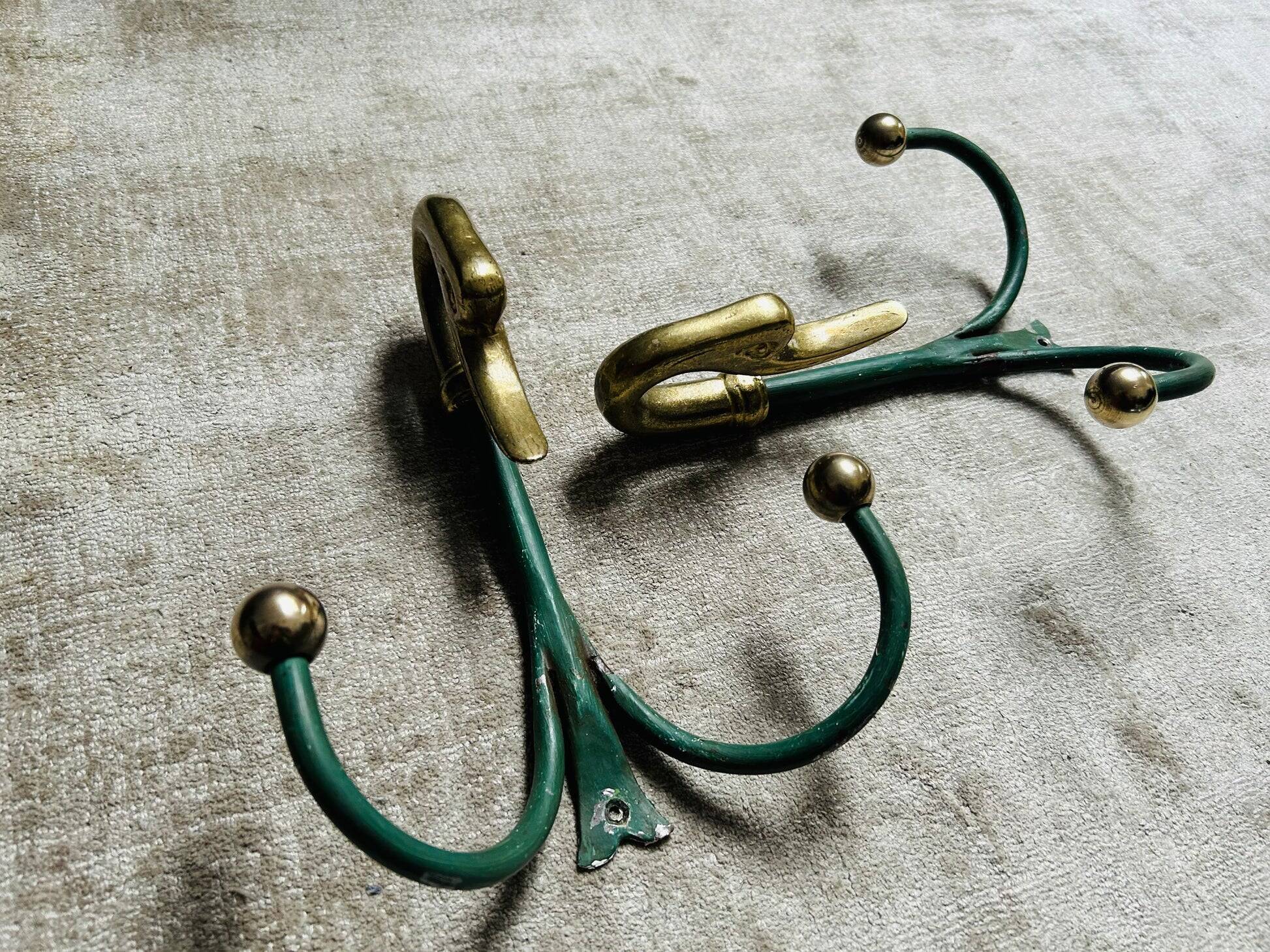 Rare set of swan neck coat hooks with mirror frame attributed to Maison Jansen, France, 1950s.