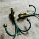 Rare set of swan neck coat hooks with mirror frame attributed to Maison Jansen, France, 1950s.