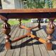 1910s Jacobean style solid oak extending drawer dining table