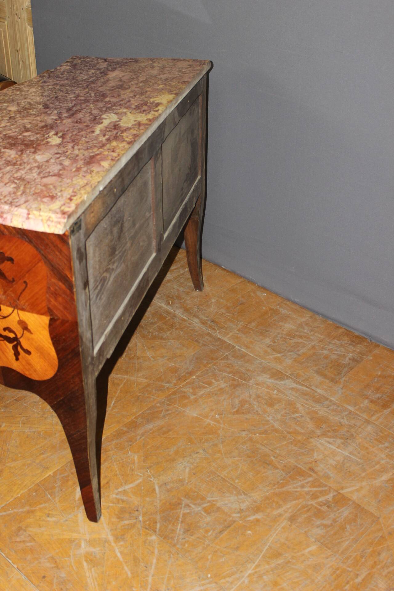 Louis XV style commode in marquetry from around 1930.